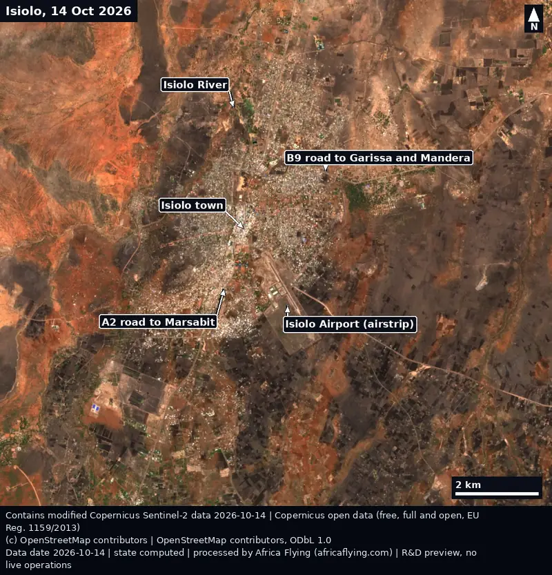 Sentinel-2 true-colour view of Isiolo, Kenya, on 14 October 2026, with labelled arrows to Isiolo town, the airstrip, the Isiolo River, the A2 road to Marsabit and the B9 road to Garissa.
